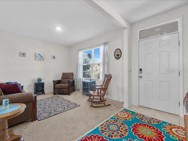 entryway with light carpet