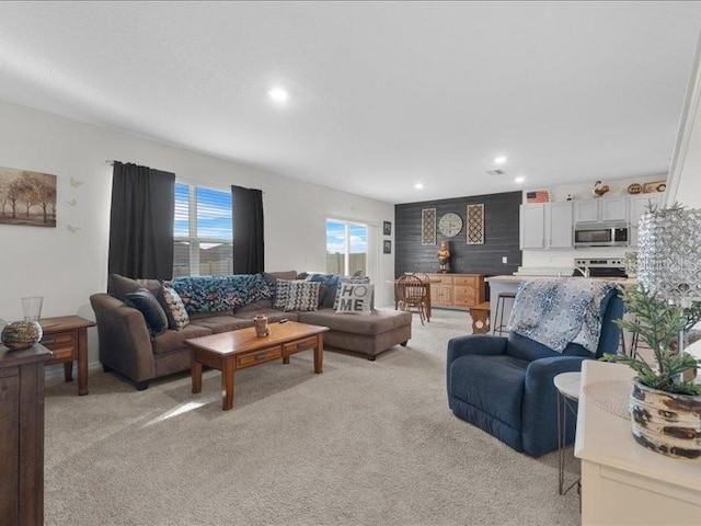 living room featuring light carpet