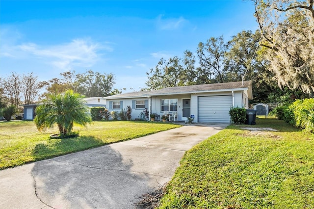 single story home featuring a garage and a front lawn