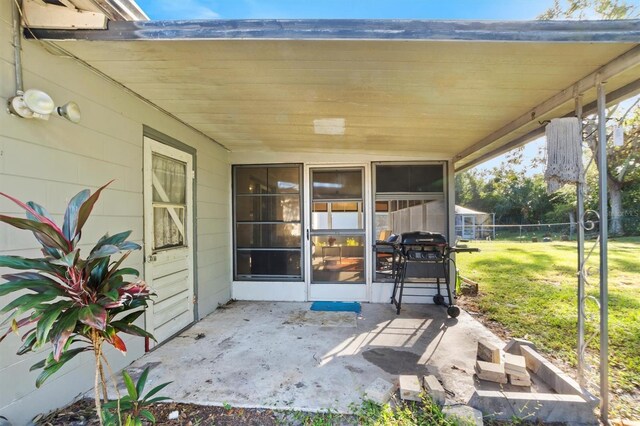 view of patio featuring a grill