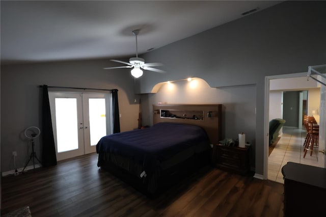 bedroom with lofted ceiling, ceiling fan, access to exterior, dark wood-type flooring, and french doors