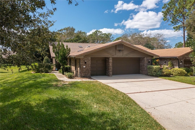 ranch-style home featuring a front lawn and a garage