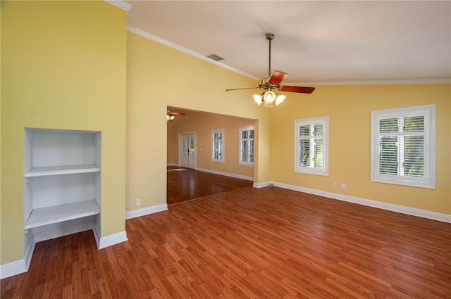 unfurnished living room with crown molding, hardwood / wood-style flooring, built in features, and ceiling fan