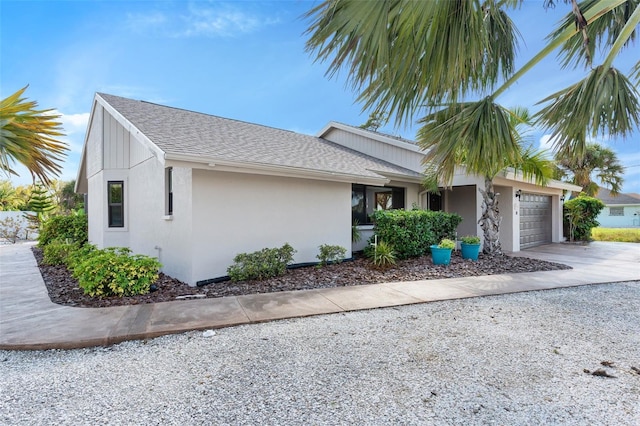 view of property exterior with a garage