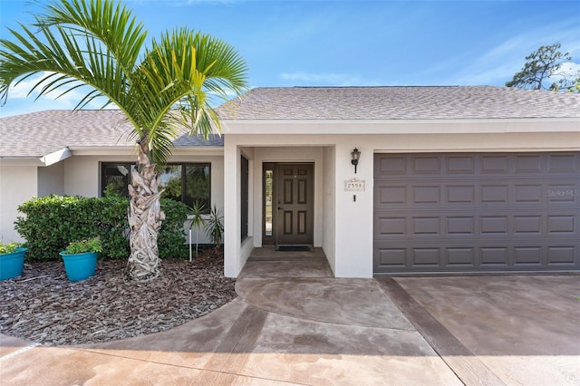 entrance to property featuring a garage