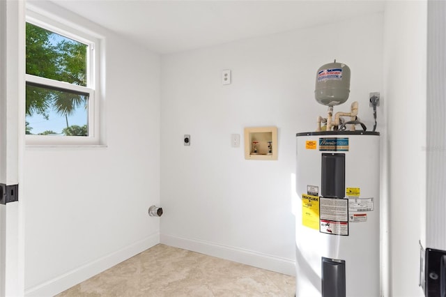 clothes washing area with hookup for an electric dryer, water heater, and hookup for a washing machine