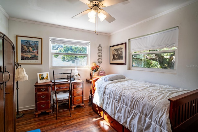 bedroom featuring dark wood-type flooring, ceiling fan, crown molding, and multiple windows