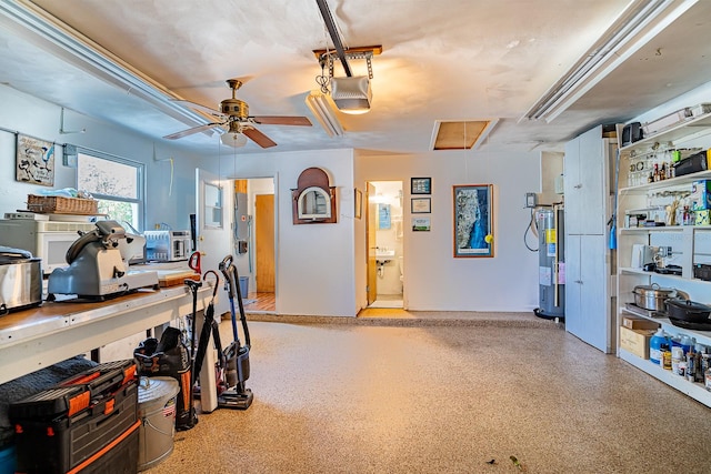 interior space featuring ceiling fan and water heater