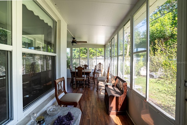 sunroom / solarium with ceiling fan