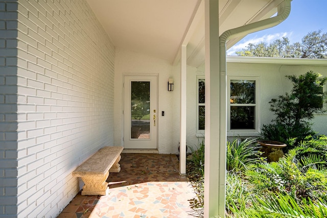 property entrance featuring a patio