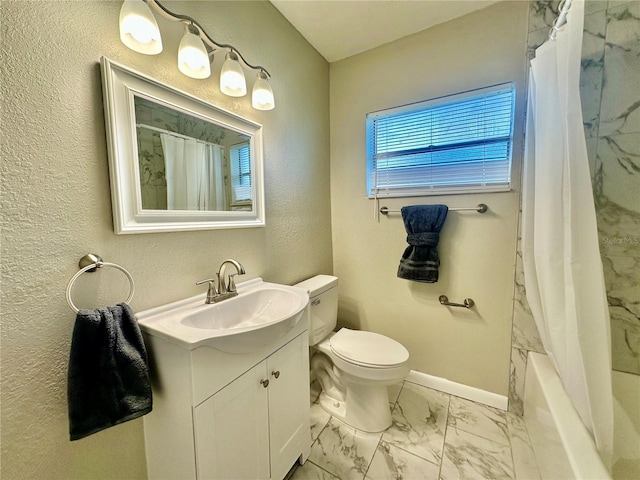 full bathroom featuring vanity, shower / tub combo, and toilet