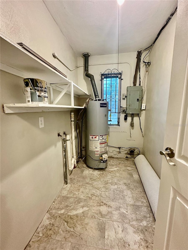 utilities with water heater and electric panel