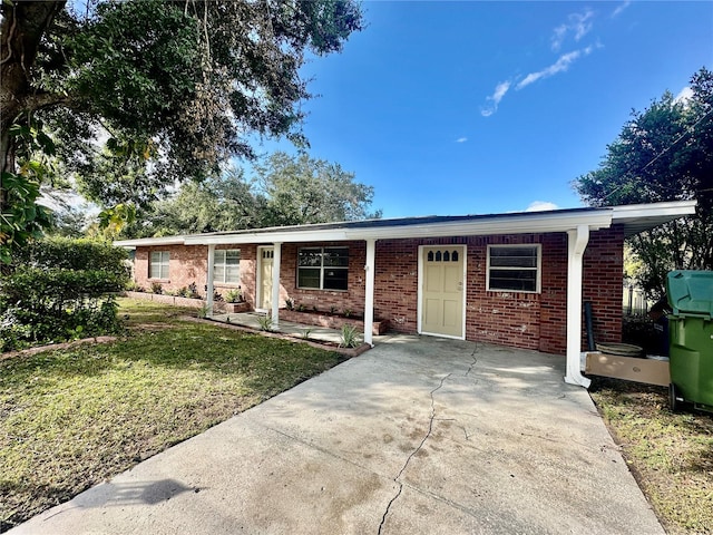 single story home featuring a front yard and a porch