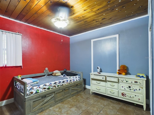 bedroom with wood ceiling, ornamental molding, and tile patterned flooring