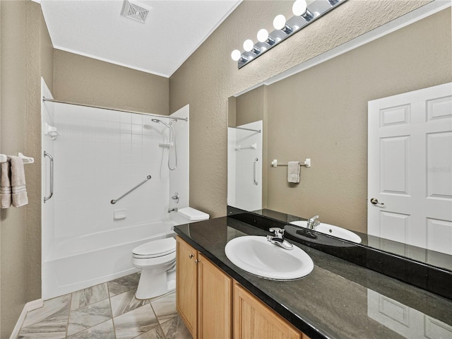 full bathroom featuring vanity, toilet, and shower / bathtub combination