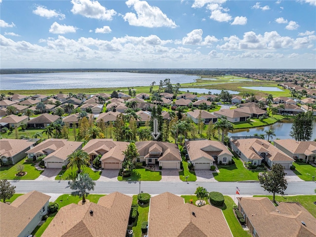 drone / aerial view featuring a water view