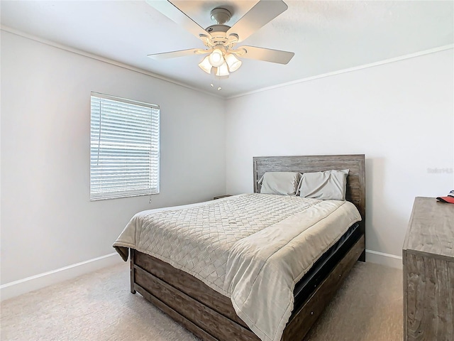 bedroom with light carpet, ornamental molding, and ceiling fan