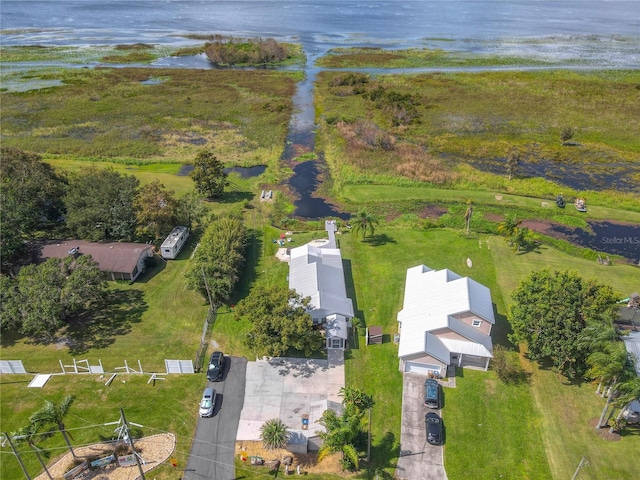 drone / aerial view with a water view