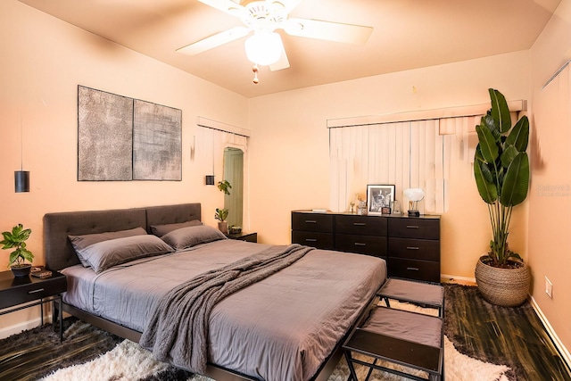 bedroom featuring ceiling fan and wood-type flooring