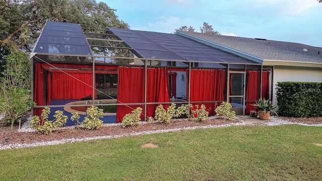 view of outbuilding featuring a yard