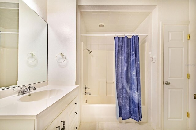 bathroom with vanity, tile patterned floors, and shower / bath combo