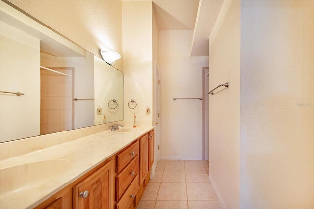 bathroom with vanity and tile patterned floors