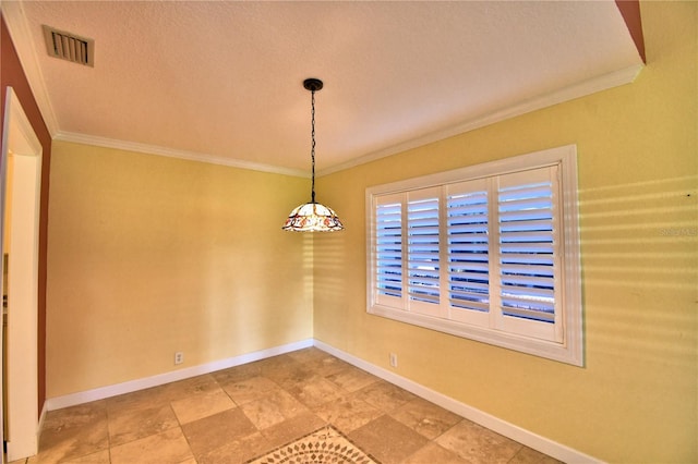 unfurnished dining area featuring crown molding