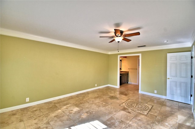 unfurnished bedroom featuring ornamental molding and ensuite bathroom