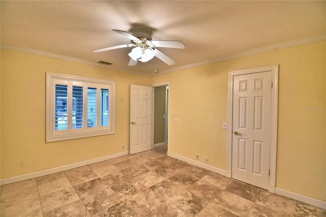 empty room with crown molding and ceiling fan