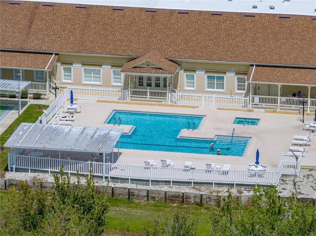 view of pool featuring a patio