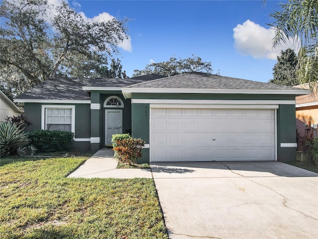 ranch-style house with a front lawn and a garage