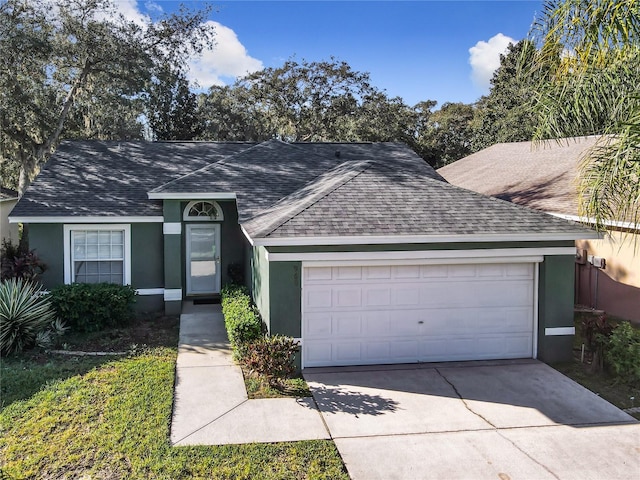 single story home featuring a garage