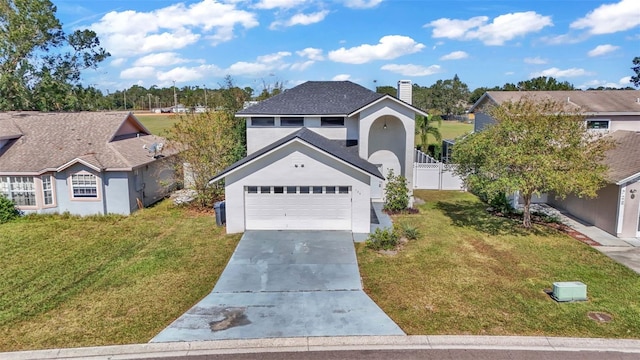 view of front facade featuring a front lawn and a garage