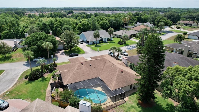 aerial view with a forest view and a residential view