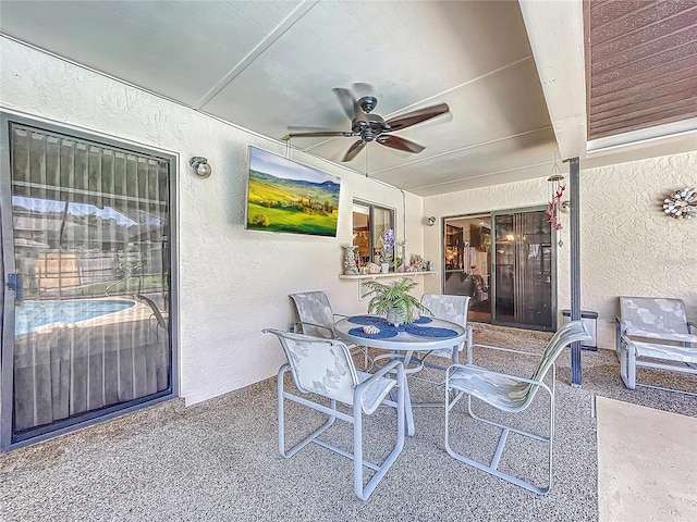 view of patio with ceiling fan