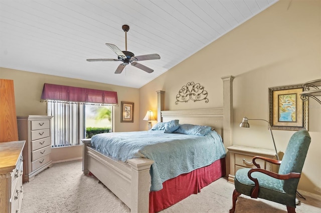 carpeted bedroom with ceiling fan and lofted ceiling