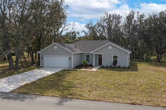 single story home with a garage and a front lawn