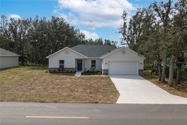 ranch-style house featuring a garage and a front lawn