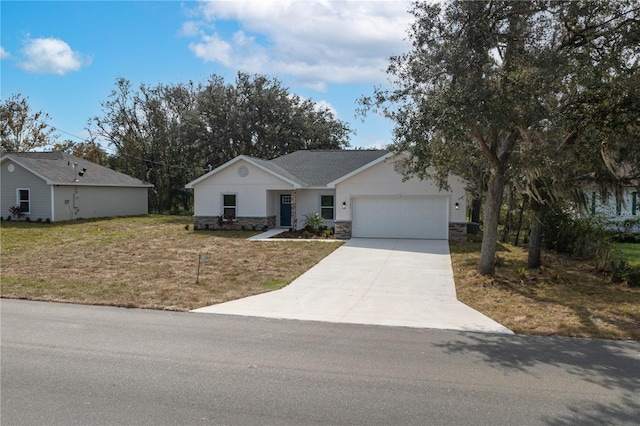 ranch-style home featuring a front lawn and a garage