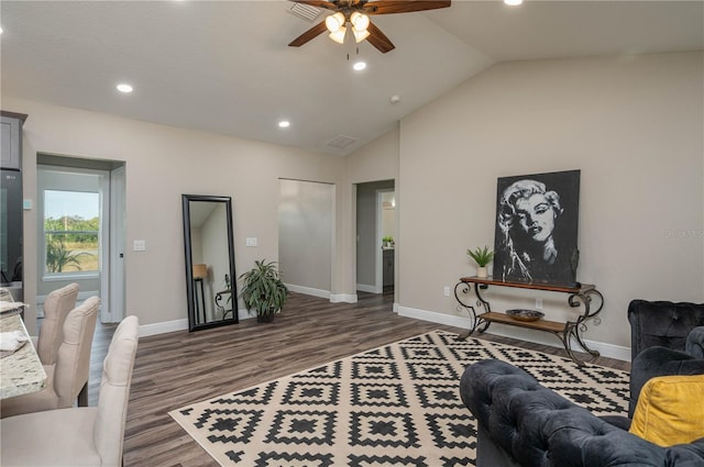 living room with high vaulted ceiling, dark hardwood / wood-style floors, and ceiling fan