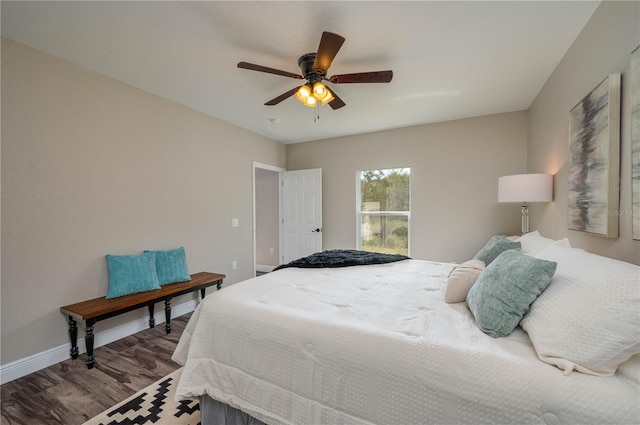 bedroom featuring hardwood / wood-style flooring and ceiling fan