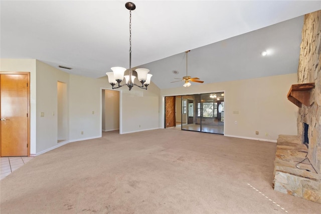 unfurnished living room featuring a stone fireplace, light carpet, high vaulted ceiling, and ceiling fan with notable chandelier