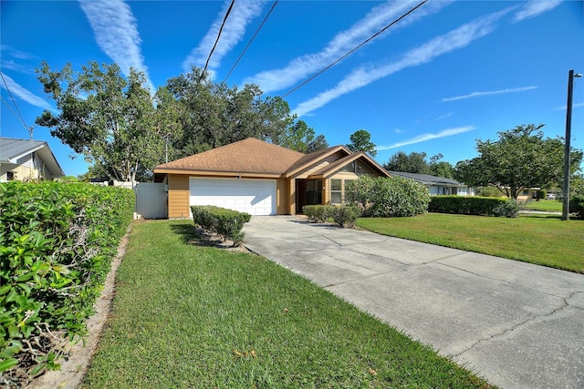 single story home featuring a front yard and a garage