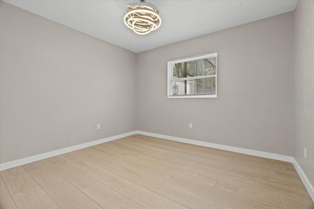 unfurnished room featuring light hardwood / wood-style flooring