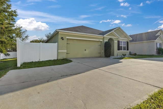 view of front of home featuring a garage