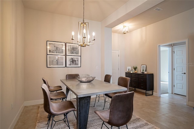 tiled dining room featuring a notable chandelier