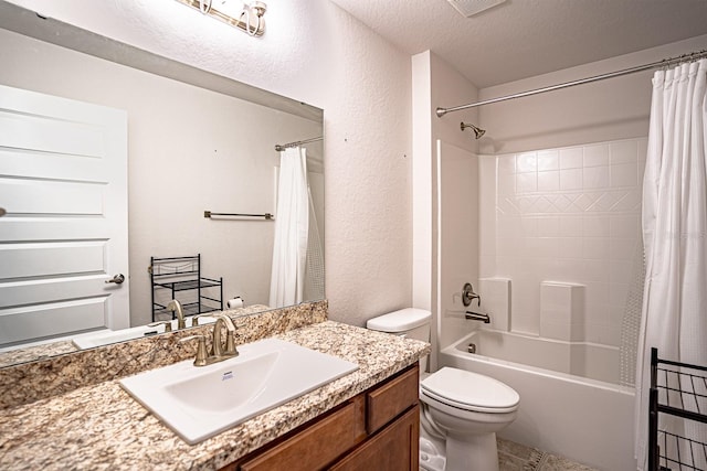 full bathroom with vanity, a textured ceiling, toilet, and shower / bathtub combination with curtain