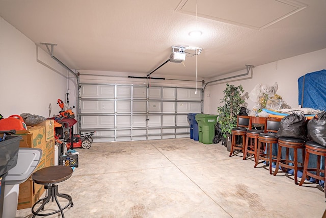 garage featuring a garage door opener