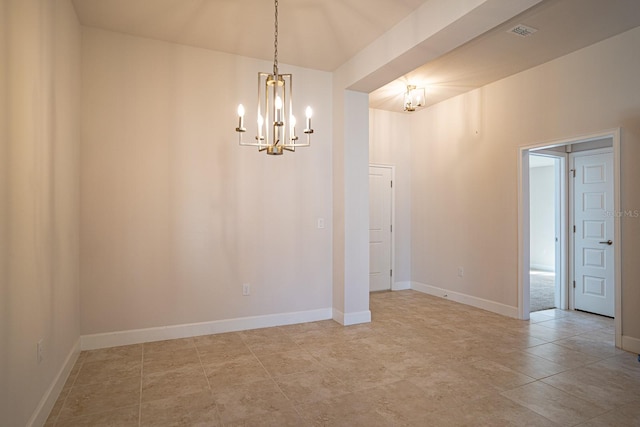 unfurnished dining area featuring a chandelier and light tile patterned floors