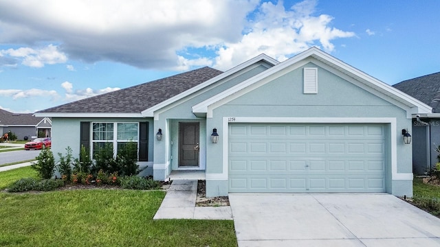 single story home featuring a front yard and a garage